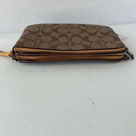 Coach NWT Wristlet Signature Print With Yellow LeatherStrap and zipper - Picture 5 of 10